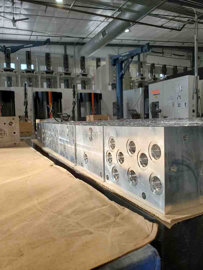 With the use of flexible manufacturing systems (FMS) from Mazak and Makino, we can run far more machines with fewer operators, increase productivity and lean on automated accuracy. FMS can store, load, transfer and unload pallets automatically to produce high-quality products in one cellular operation.